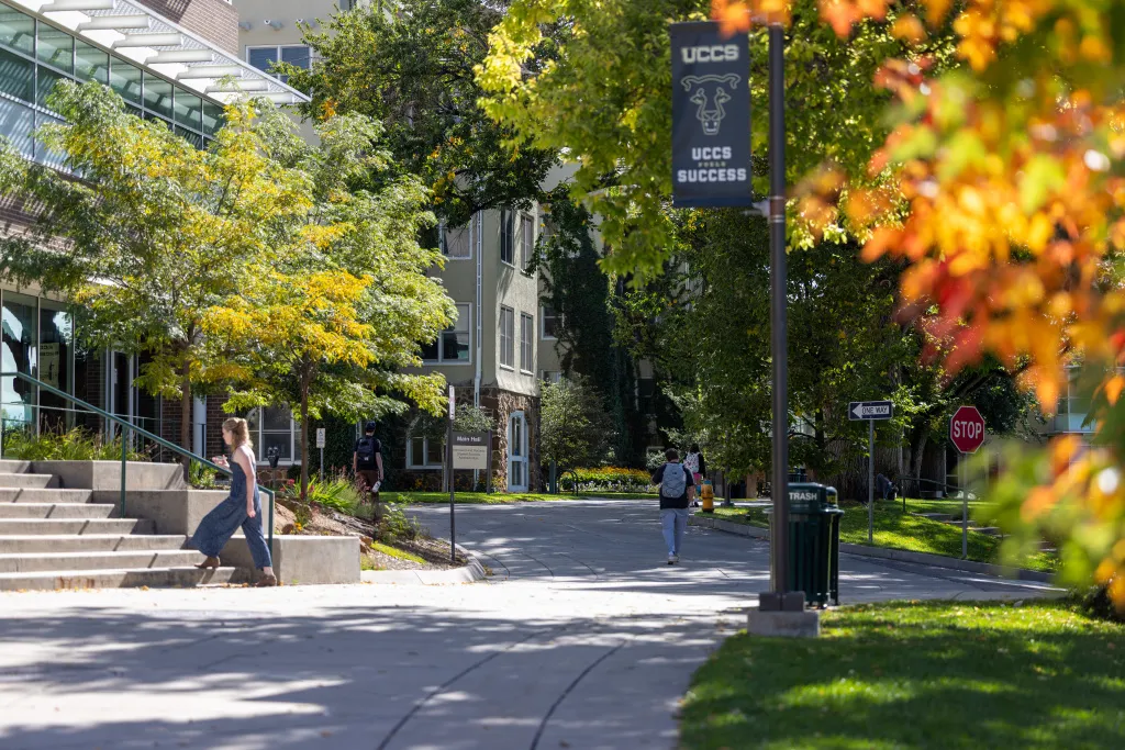 fall foliage in front of Dwire Hall